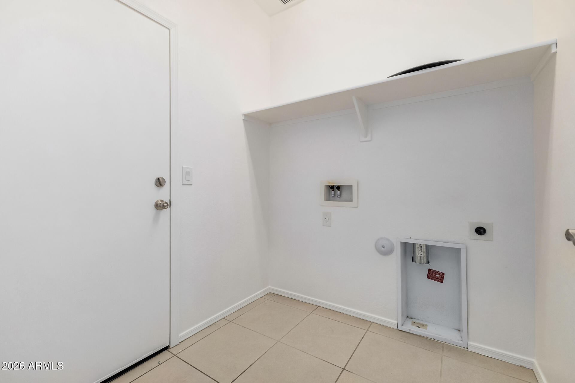 4228 West Coles Road Laveen, AZ 85339 - Photo 35 of 36 a view of an empty room