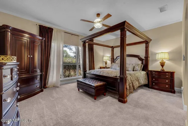 a view of a bathroom from a corridor
