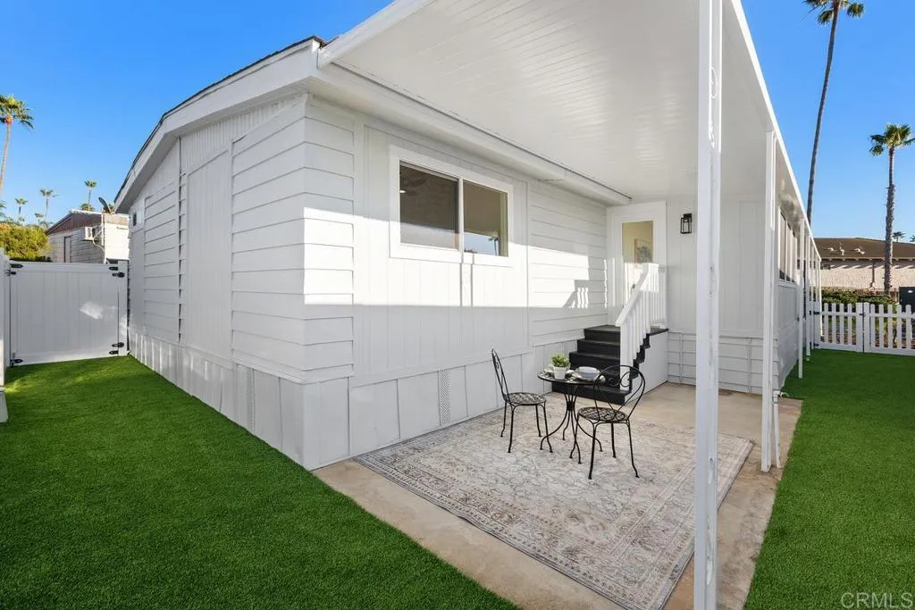 7144 Santa Rosa, Unit 86 Carlsbad, CA 92011 - Photo 35 of 41 a house view with a seating space