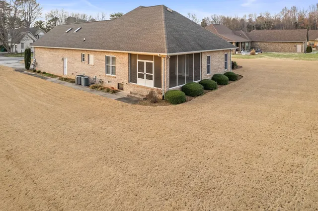 a front view of a house with lake view