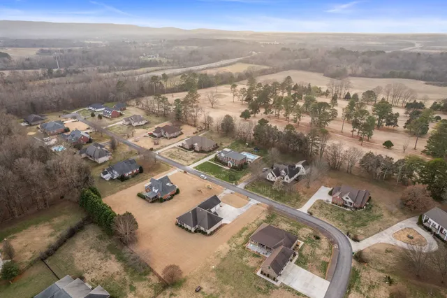 a view of a white house with a outdoor space