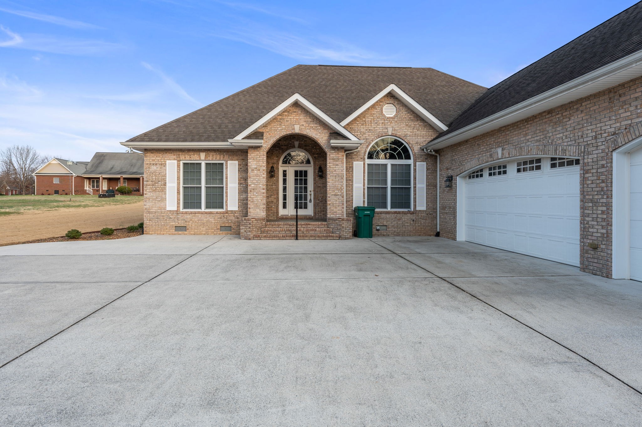 657 Pickney Road Winchester, TN 37398 - Photo 28 of 66 a front view of a house with a yard and garage