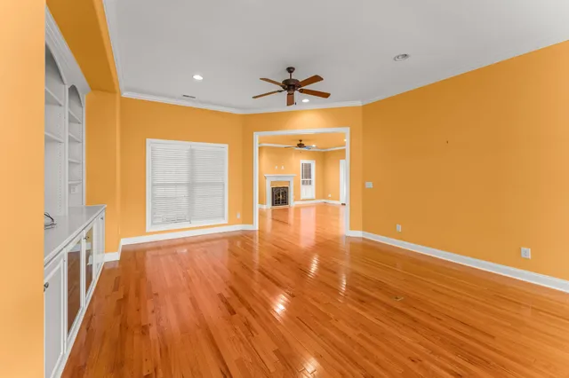 a kitchen that has a sink and a stove in it