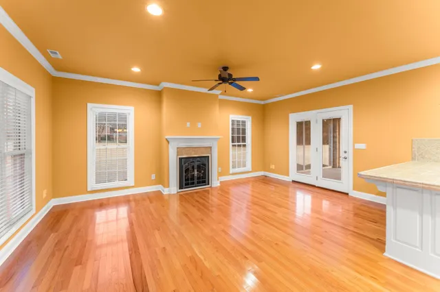 a kitchen with stainless steel appliances granite countertop a stove and a refrigerator