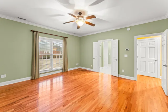 a bathroom with a granite countertop sink mirror and double