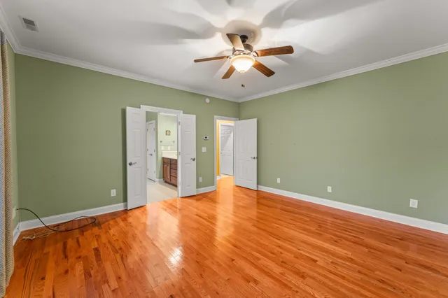 a bathroom with a toilet and shower