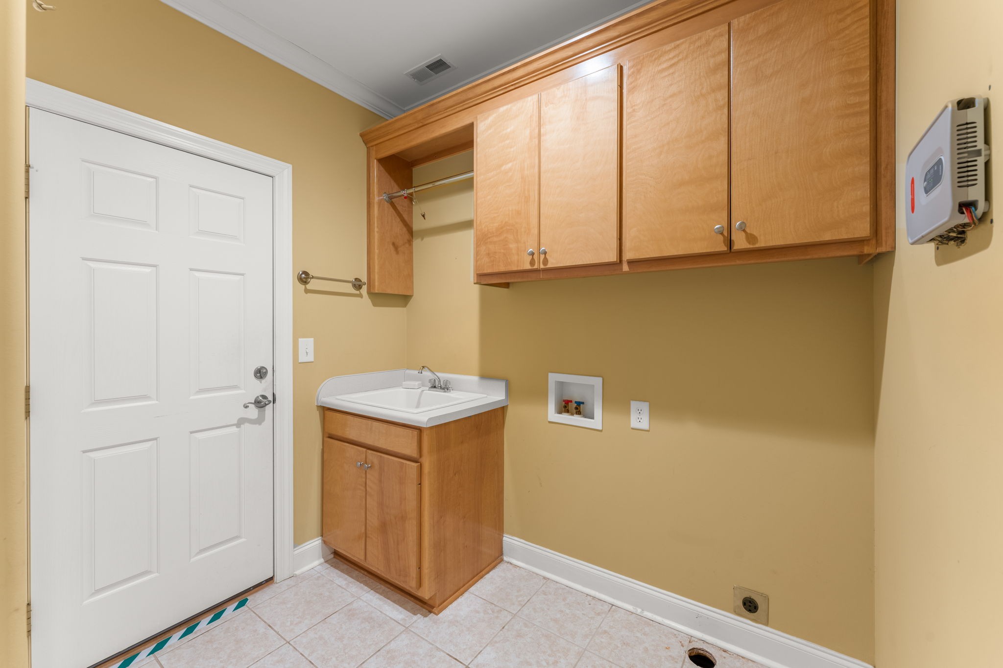 657 Pickney Road Winchester, TN 37398 - Photo 59 of 66 a view of cabinets and utility room with a window