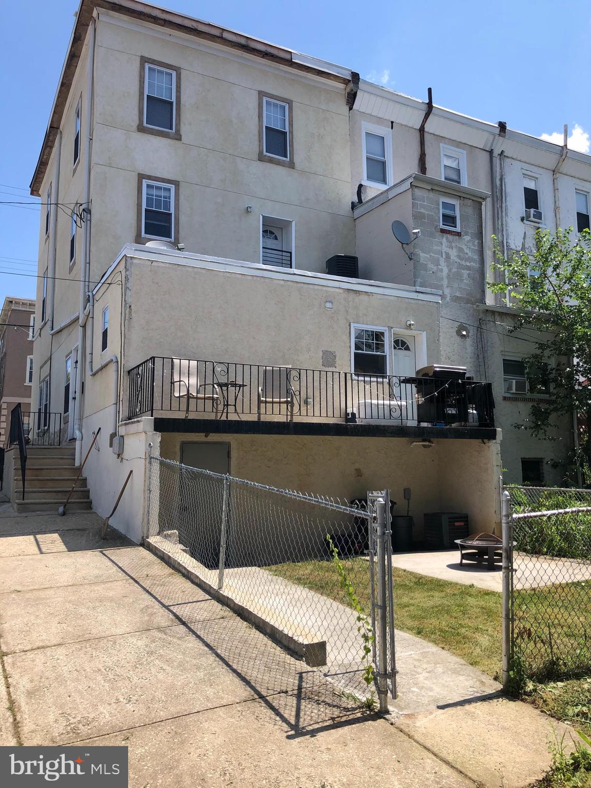 3350 Conrad Street, Unit B Philadelphia, PA 19129 - Photo 1 of 16 a view of a building with many windows