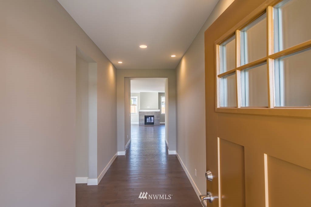 40 Lillian Ridge Court Sequim, WA 98382 - Photo 4 of 23 a view of hallway with wooden floor