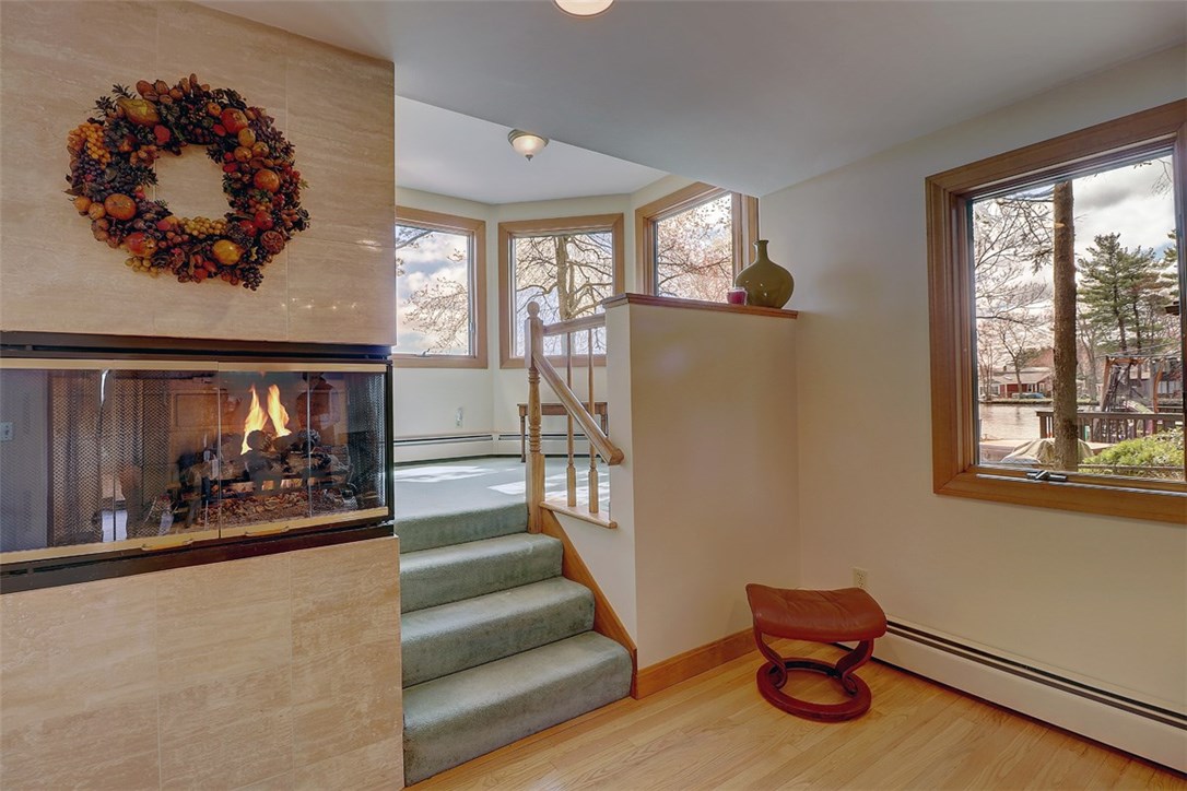 25 Dixie Road Coventry, RI 02816 - Photo 26 of 37 Gas fireplace in dinning room and possible office off stairs?