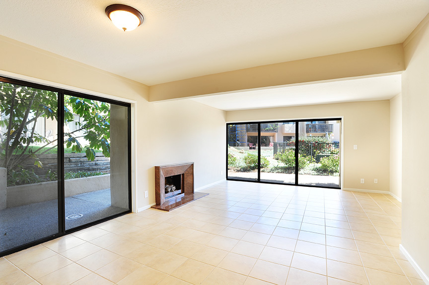 3375 Foothill Road, Unit 811 Carpinteria, CA 93013 - Photo 7 of 15 a view of an empty room with a fireplace and a large window
