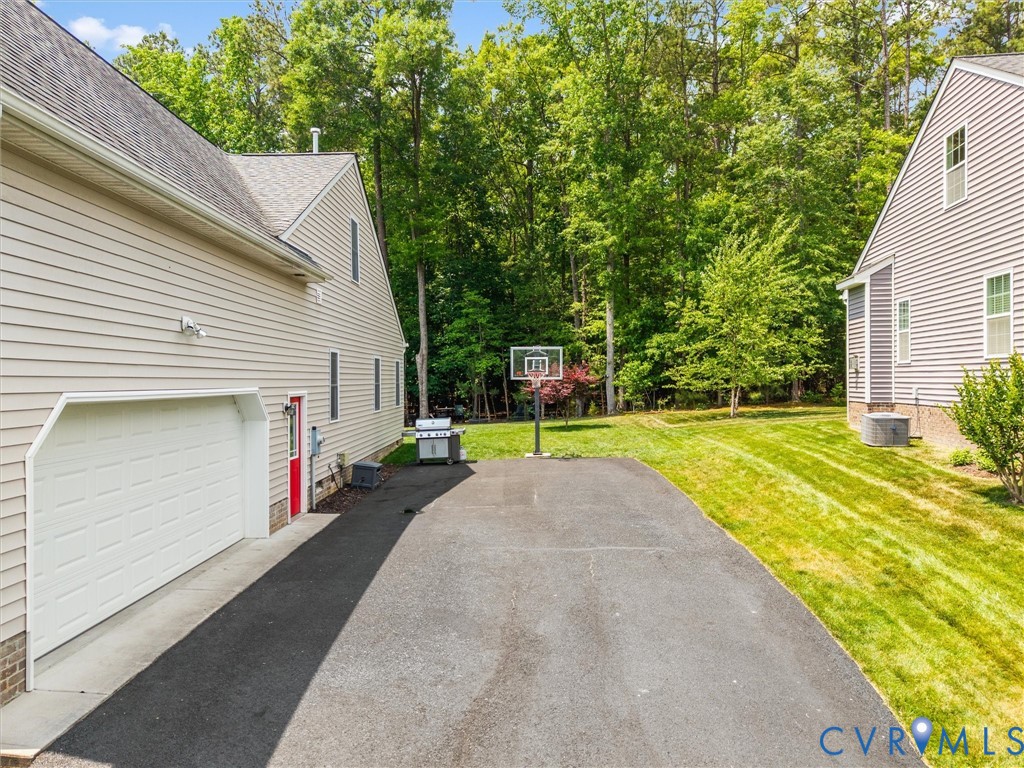 10824 Avening Road Chesterfield, VA 23832 - Photo 42 of 47 a view of outdoor space yard and swimming pool