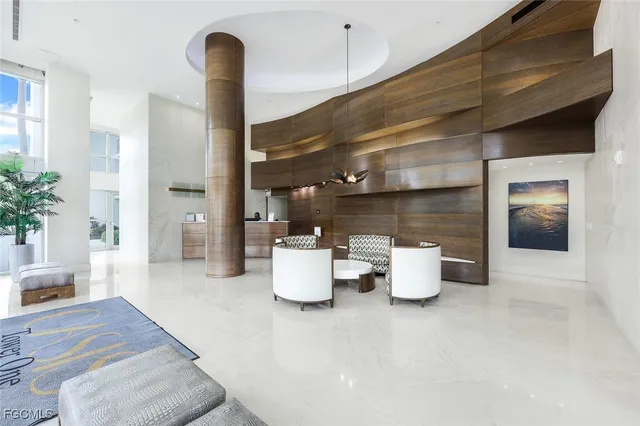 a floor to ceiling window and potted plant