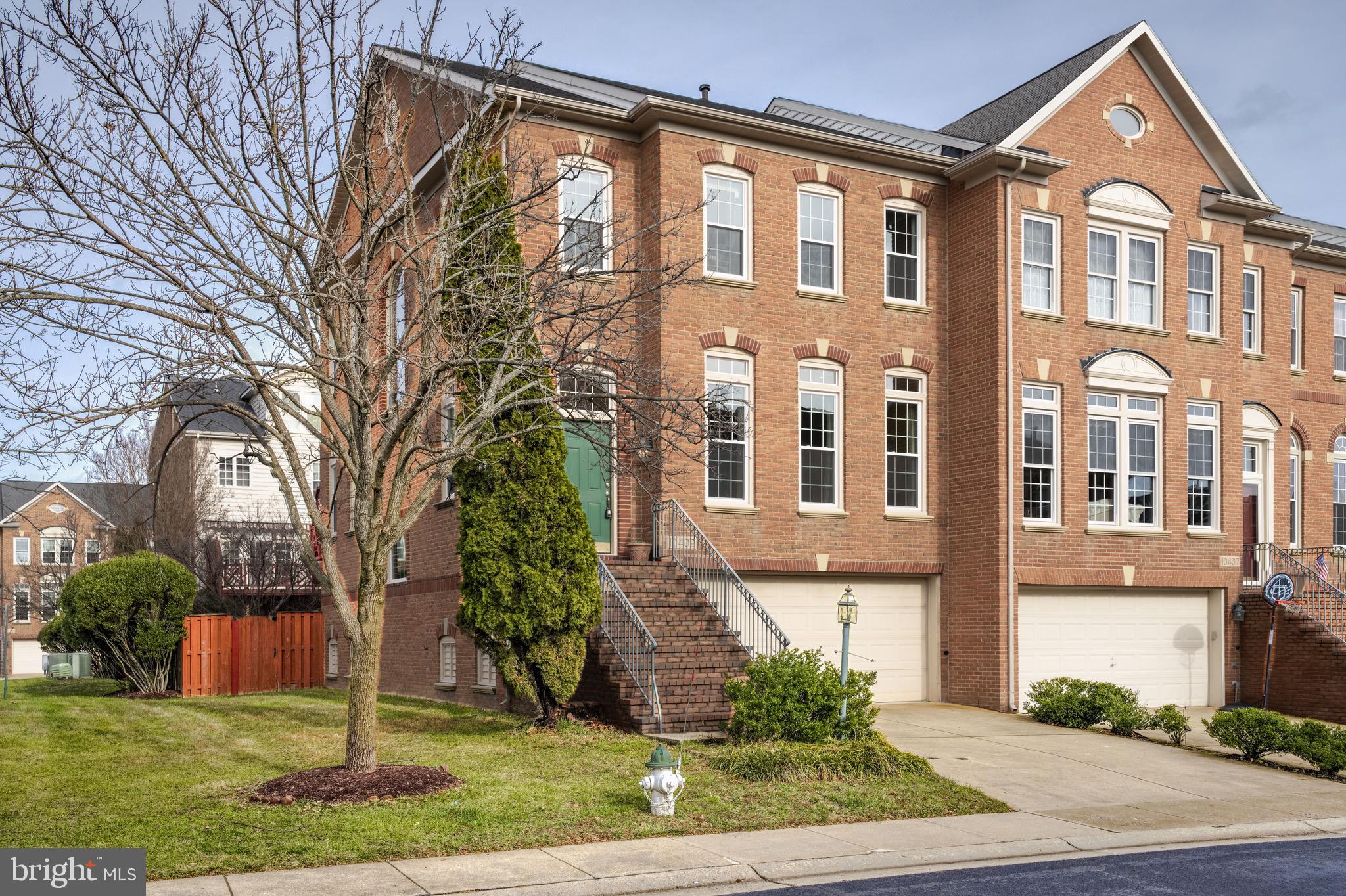 10409 Overgate Place Potomac, MD 20854 - Photo 1 of 29 a front view of a house with a yard
