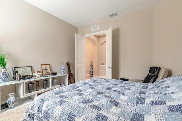 a kitchen with stainless steel appliances granite countertop a sink refrigerator and cabinets
