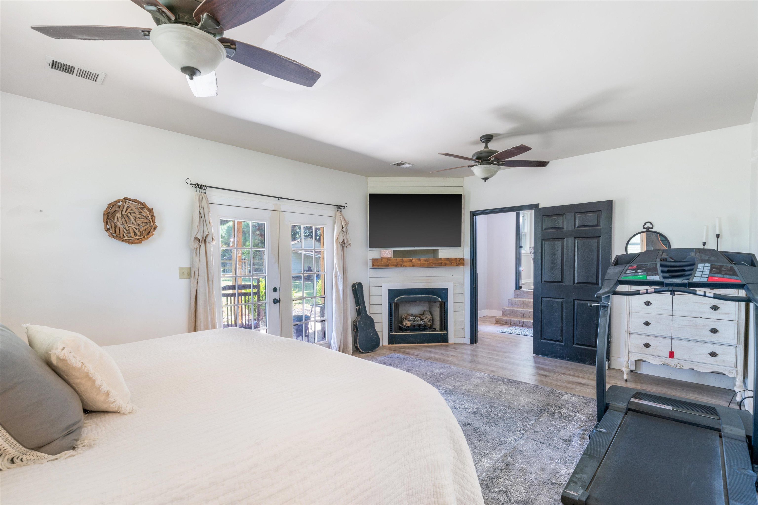 10275 Moose Road Millington, TN 38053 - Photo 12 of 25 a spacious bedroom with a bed and a fireplace
