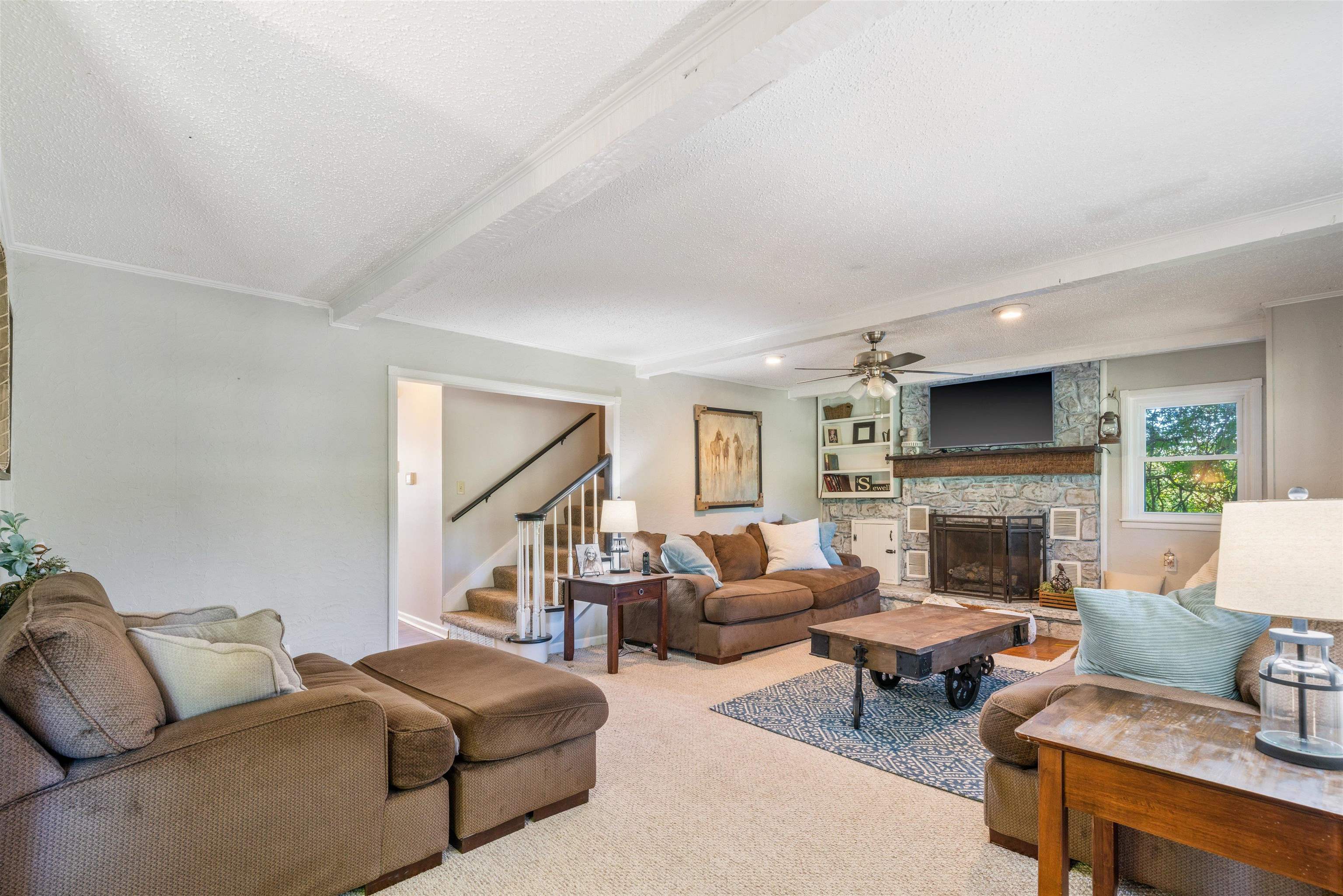 10275 Moose Road Millington, TN 38053 - Photo 3 of 25 a living room with furniture fireplace and a table