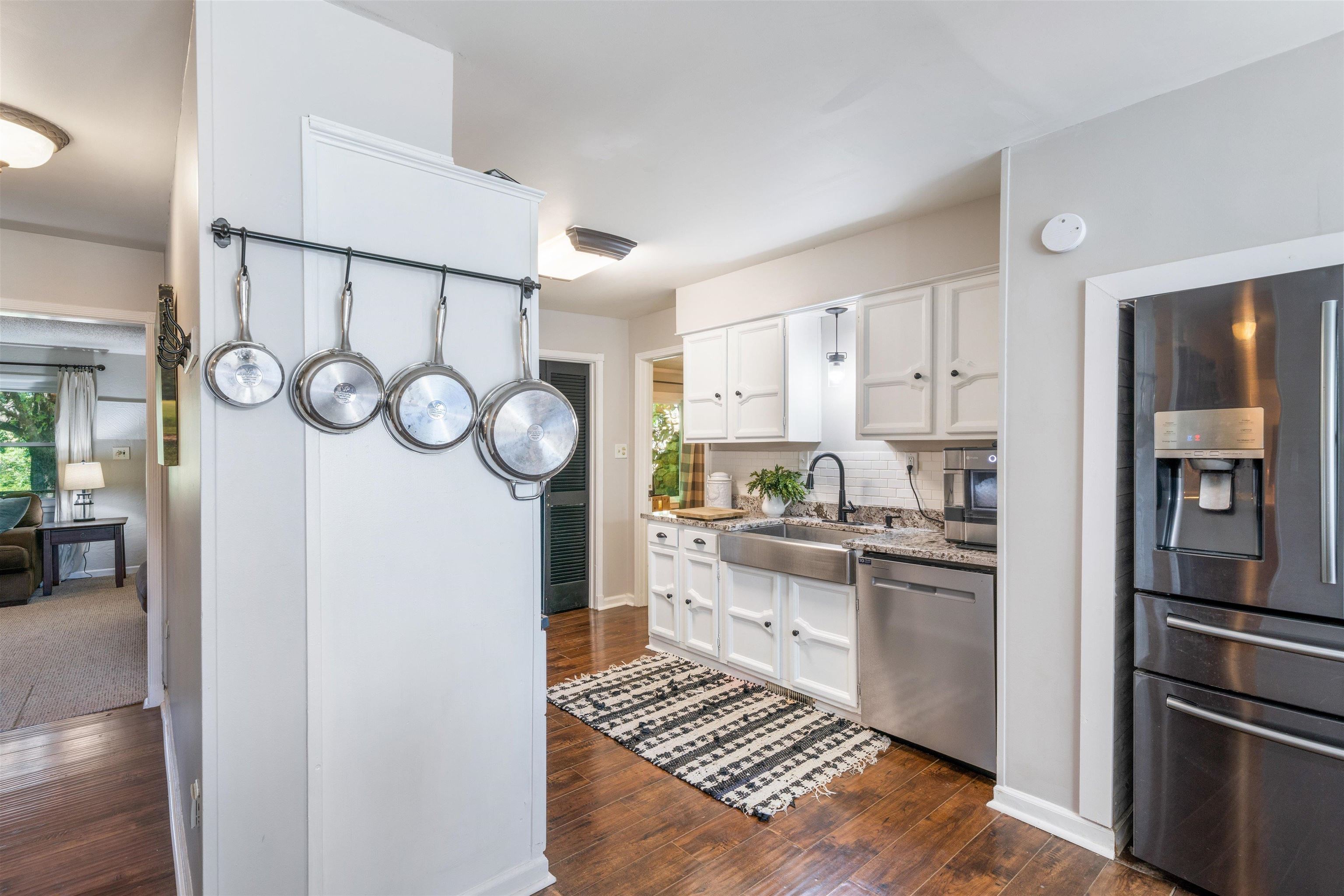10275 Moose Road Millington, TN 38053 - Photo 5 of 25 a kitchen with stainless steel appliances granite countertop a refrigerator and a stove top oven
