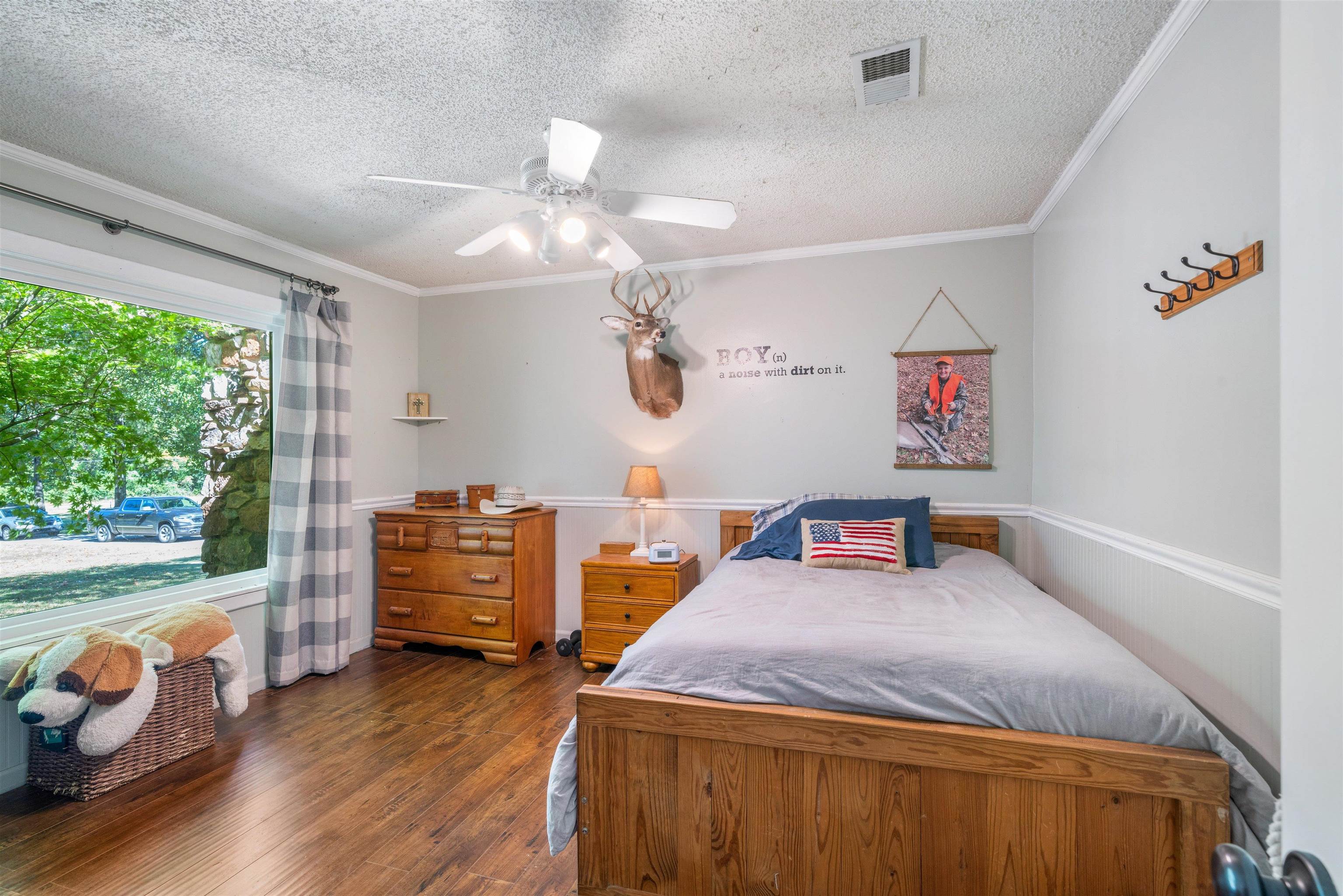 10275 Moose Road Millington, TN 38053 - Photo 9 of 25 a bedroom with a bed and wooden floor
