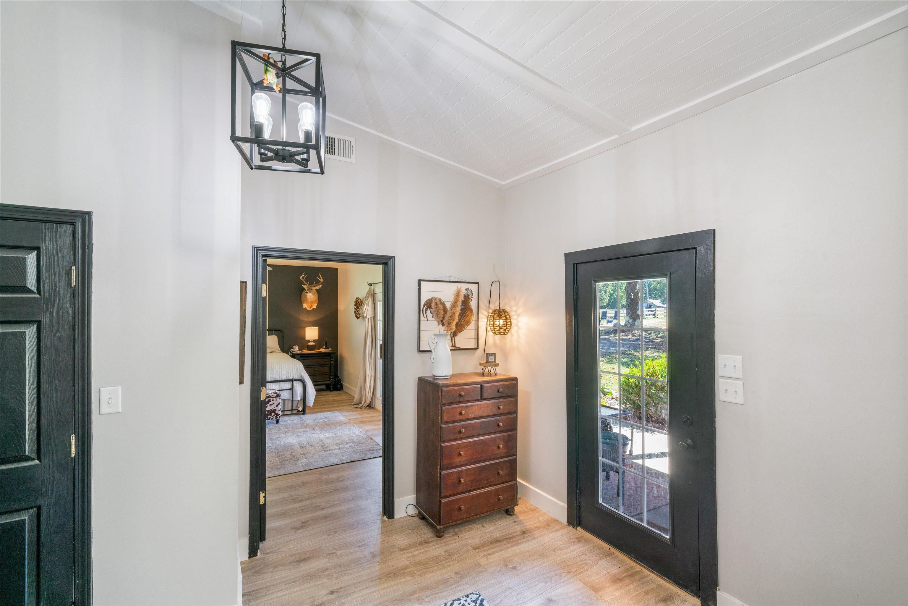 10275 Moose Road Millington, TN 38053 - Photo 10 of 25 a view of a hallway with wooden floor and windows