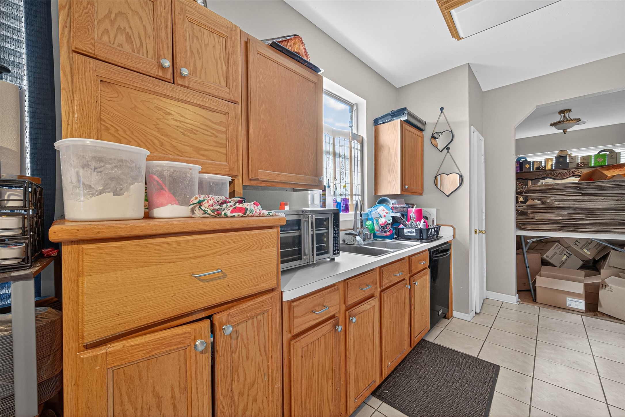 907 Morley Park Lane Spring, TX 77373 - Photo 20 of 44 a kitchen with a sink stove and cabinets