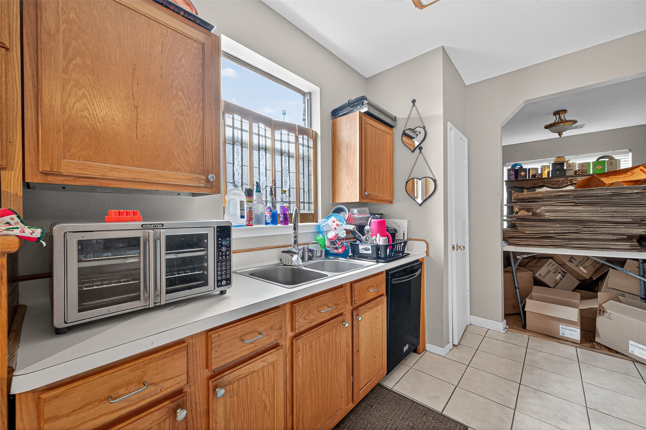 907 Morley Park Lane Spring, TX 77373 - Photo 21 of 44 a kitchen with stainless steel appliances a sink and cabinets