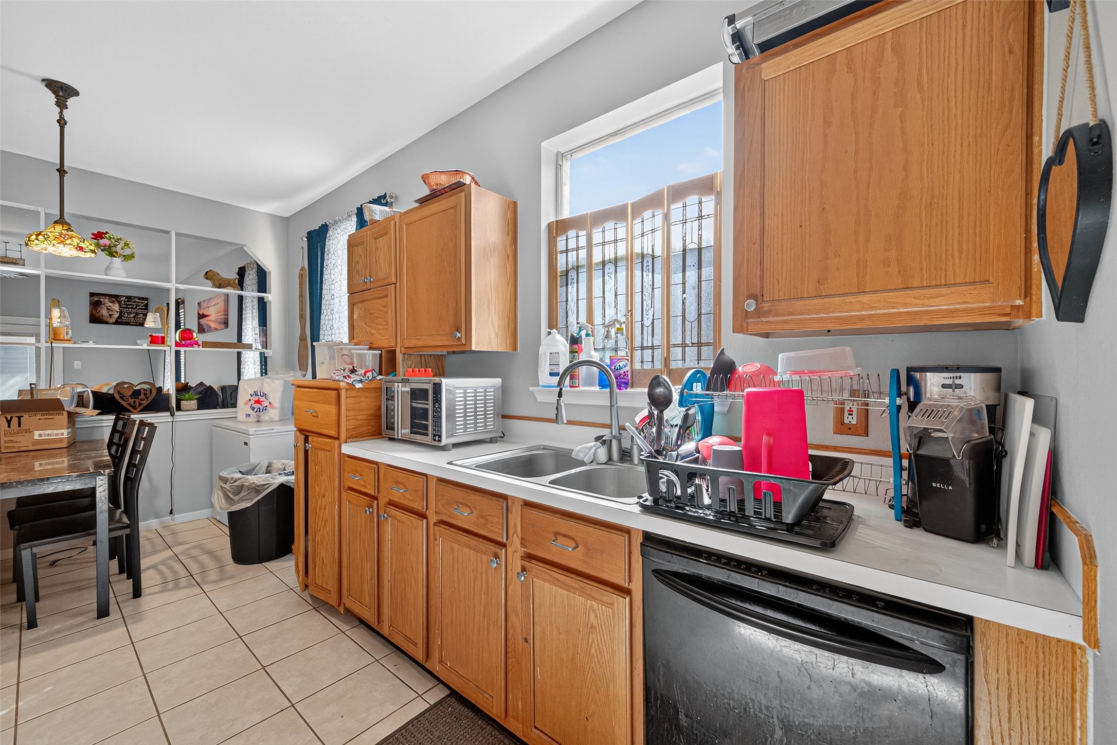 907 Morley Park Lane Spring, TX 77373 - Photo 24 of 44 a kitchen that has a sink and a stove in it