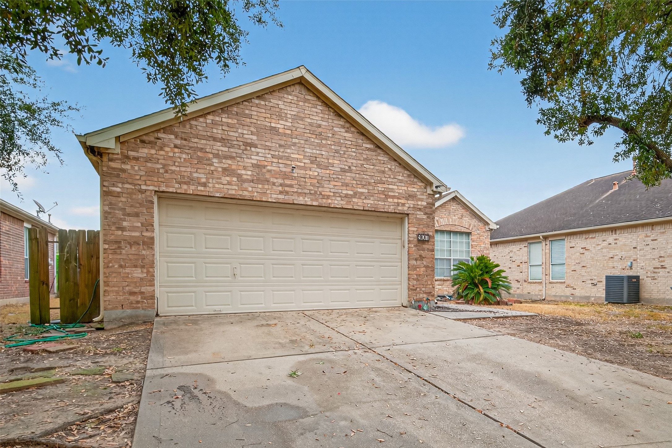 907 Morley Park Lane Spring, TX 77373 - Photo 3 of 44 a view of a house with a yard and garage