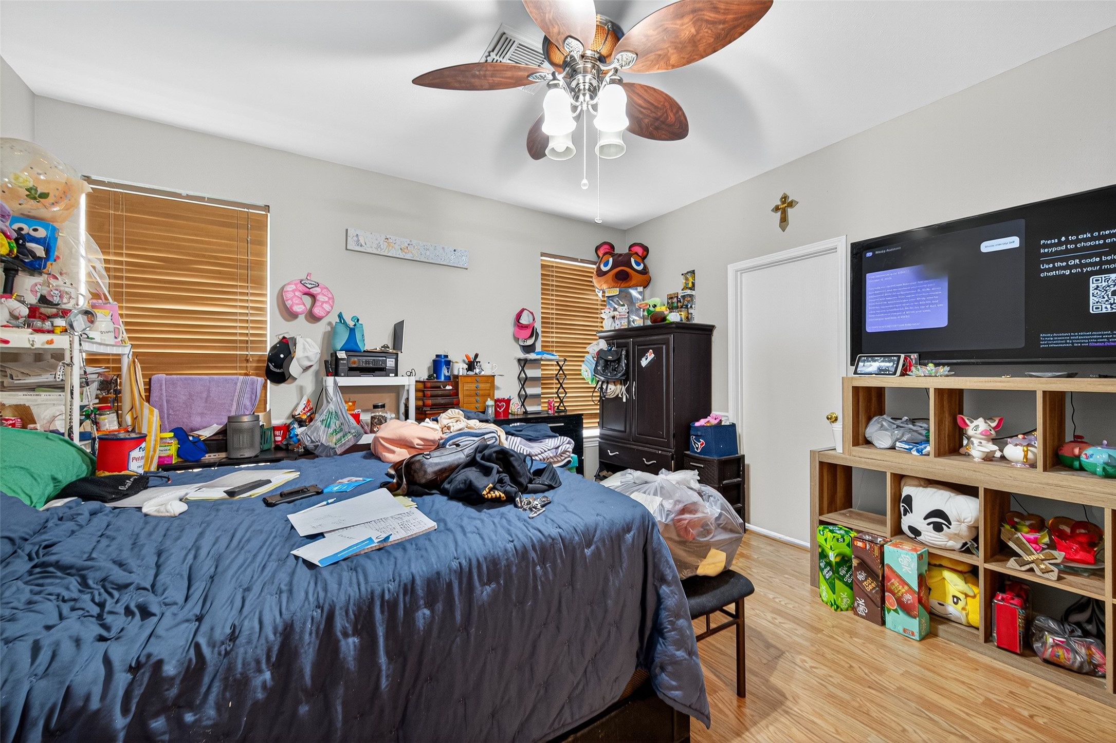 907 Morley Park Lane Spring, TX 77373 - Photo 36 of 44 a bedroom with furniture a small book shelf and a window