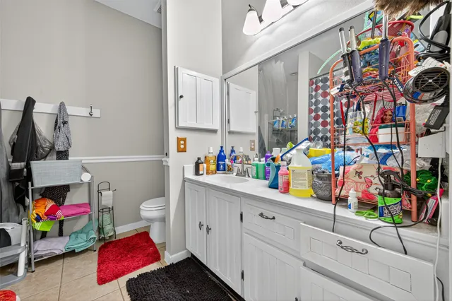 a view of a dining room with furniture and toys