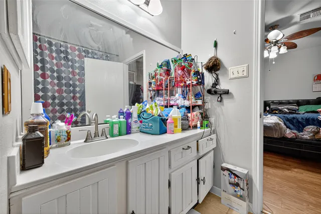a view of a house with a wooden deck