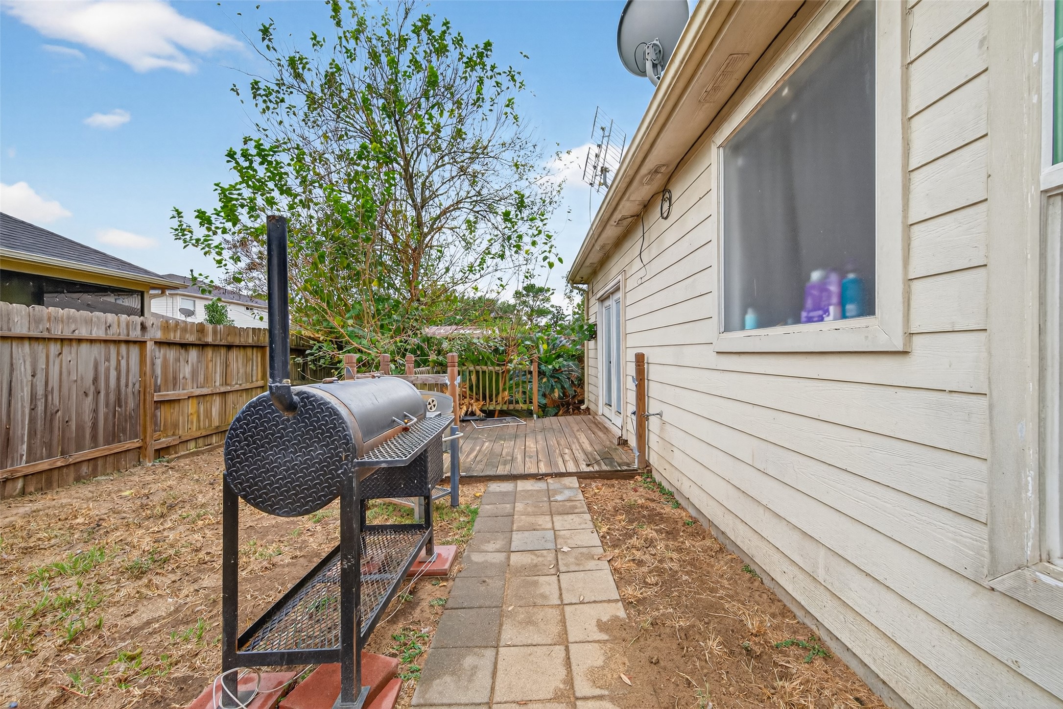 907 Morley Park Lane Spring, TX 77373 - Photo 44 of 44 a view of balcony with wooden floor and outdoor seating