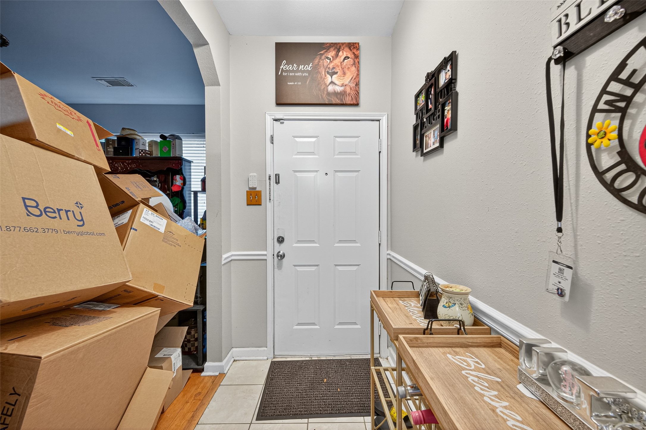 907 Morley Park Lane Spring, TX 77373 - Photo 9 of 44 a view of a hallway with paintings on the wall