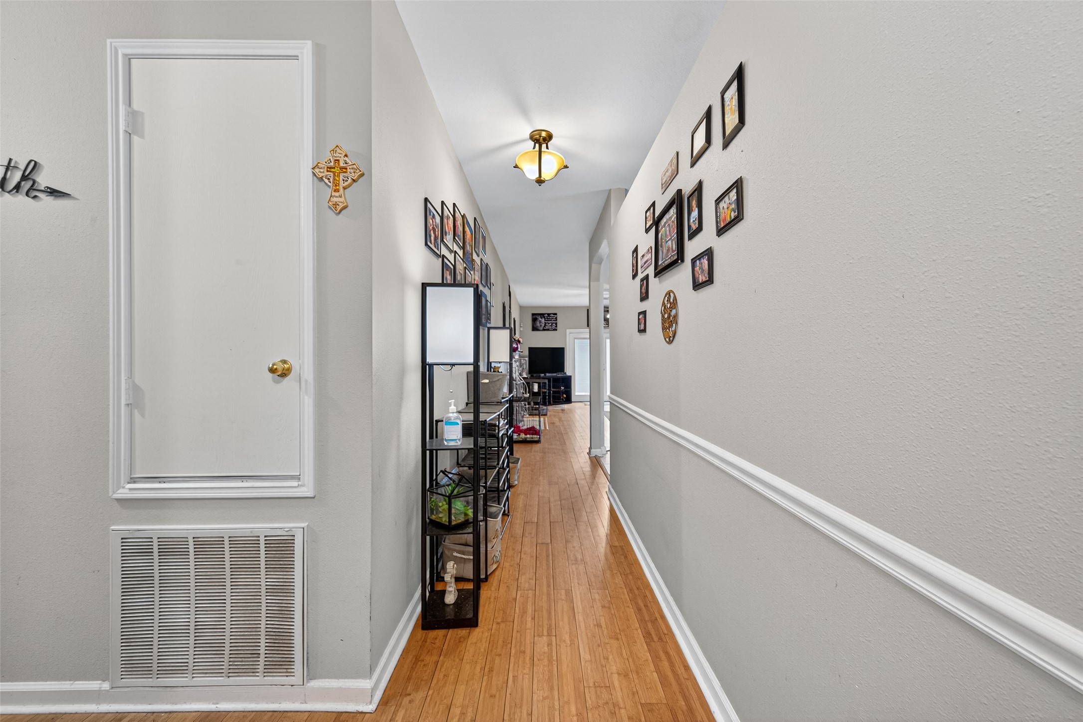 907 Morley Park Lane Spring, TX 77373 - Photo 10 of 44 a view of entryway with stairs and wooden floor