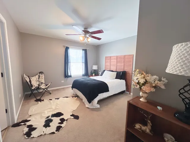 a city view with tall buildings and a yard