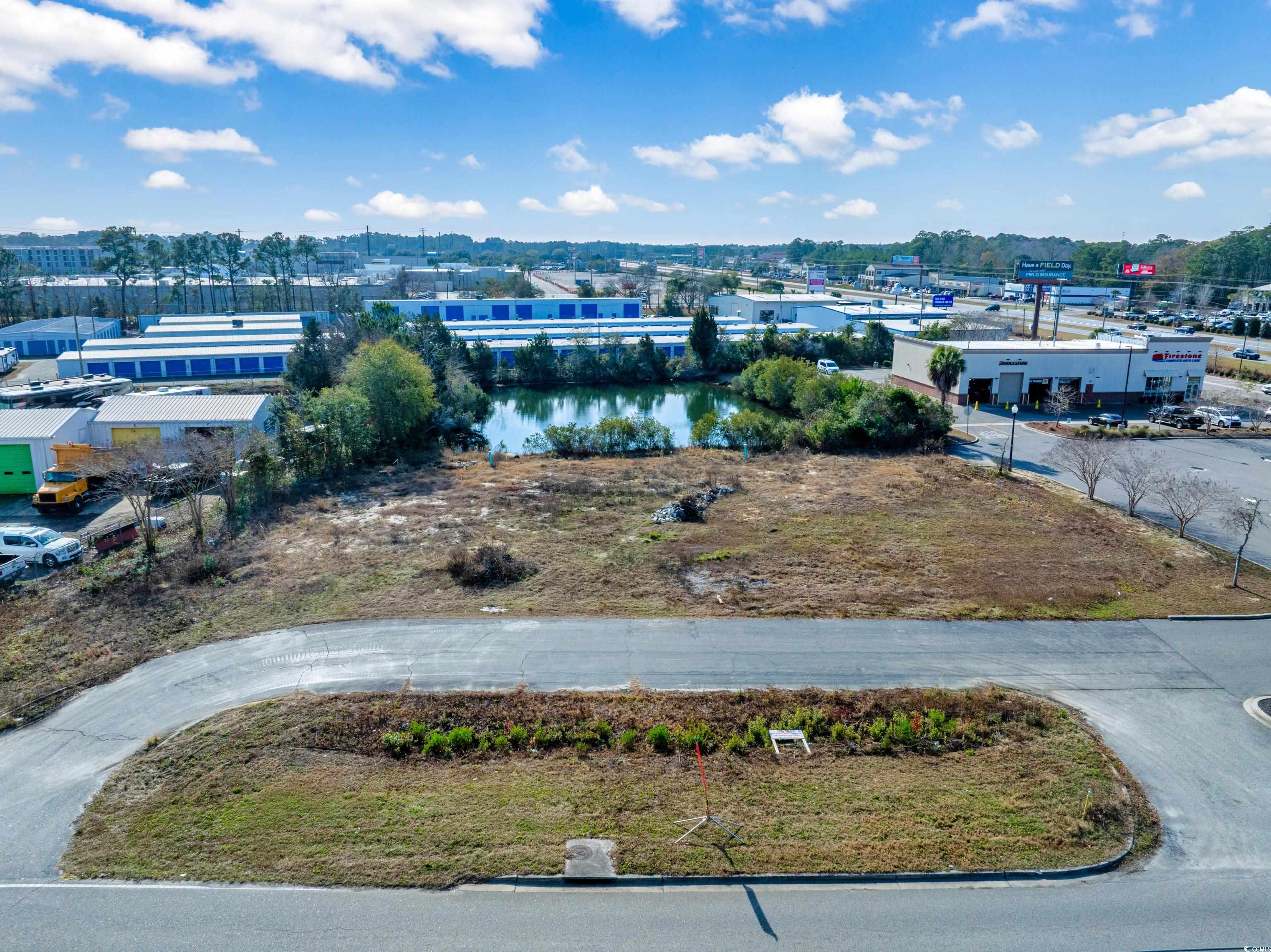 Inlet Square Drive Murrells Inlet, SC 29576 - Photo 1 of 7 Drone / aerial view of a nearby body of water
