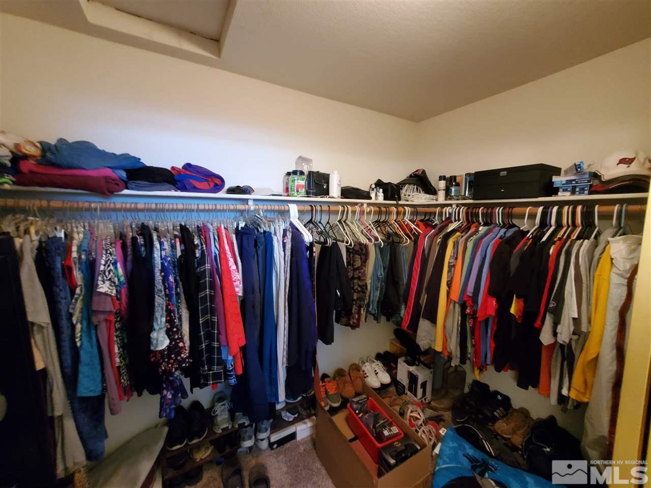 5299 Simons Drive Reno, NV 89523 - Photo 13 of 29 a view of walk in closet with clothes