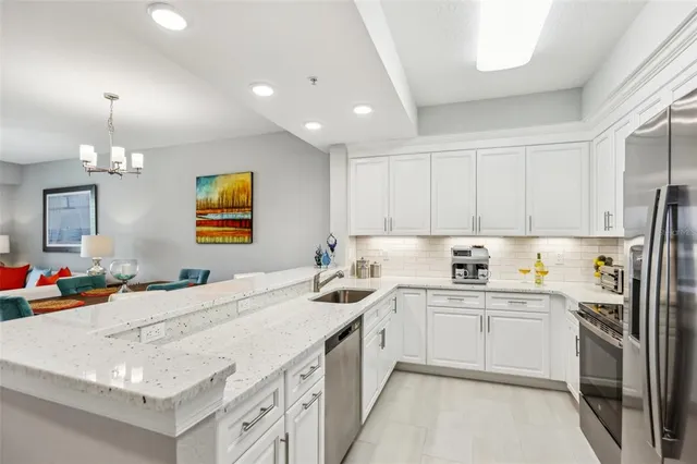 a kitchen with sink and window