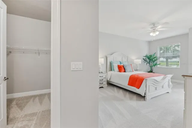 a bathroom with a bathtub sink and mirror