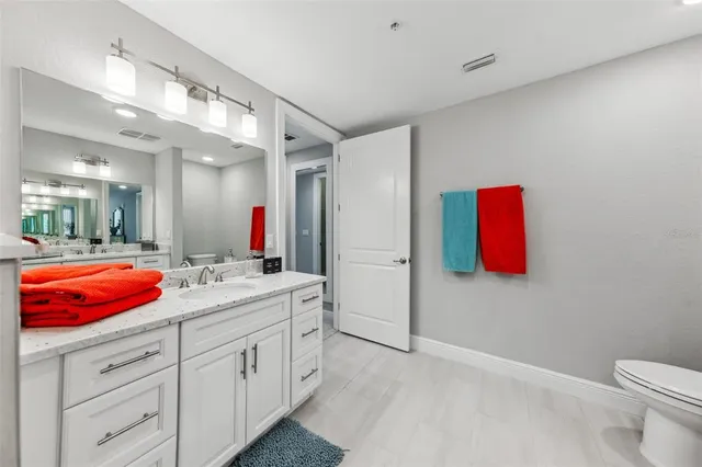 a view of a workspace with furniture and a workspace