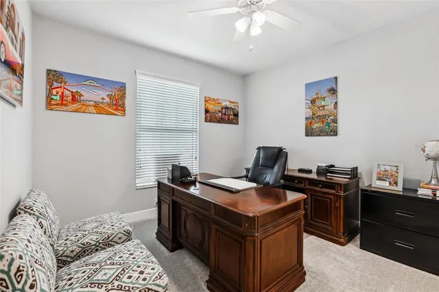 a view of swimming pool with outdoor seating and city view