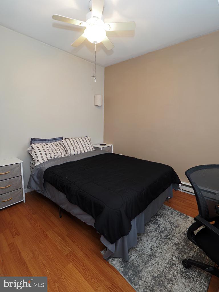305 West 8th Street Bethlehem, PA 18015 - Photo 12 of 28 Cozy bedroom with warm wood floors.