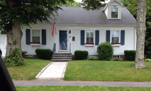 12 Calvert Road Walpole, MA 02032 - Photo 1 of 30 a front view of a house with a yard