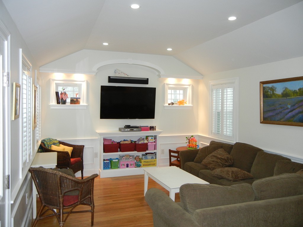 12 Calvert Road Walpole, MA 02032 - Photo 12 of 30 a living room with furniture and a flat screen tv