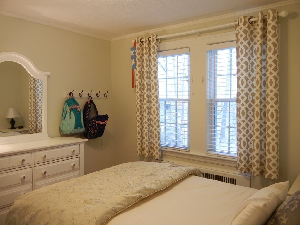 12 Calvert Road Walpole, MA 02032 - Photo 17 of 30 a bedroom with a bed and a dresser