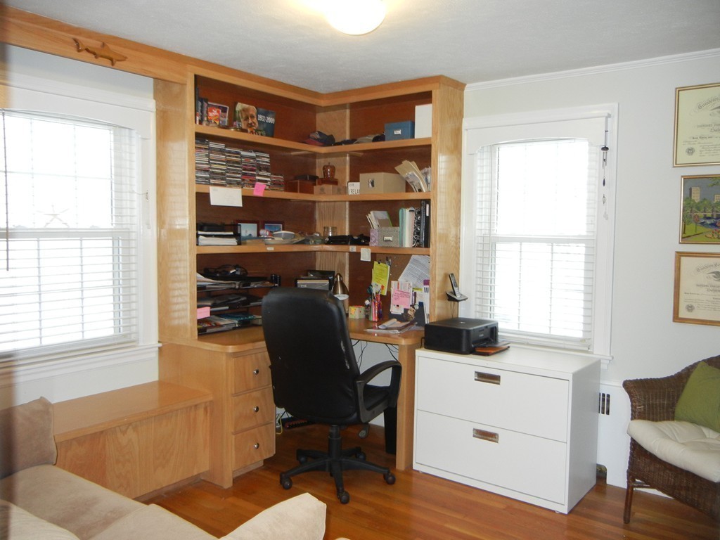 12 Calvert Road Walpole, MA 02032 - Photo 19 of 30 a view of a workspace with furniture and a window