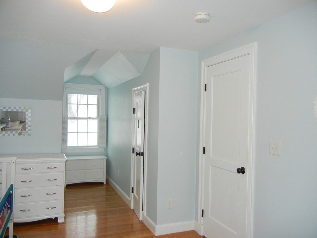 12 Calvert Road Walpole, MA 02032 - Photo 23 of 30 a view of livingroom with hardwood floor and window