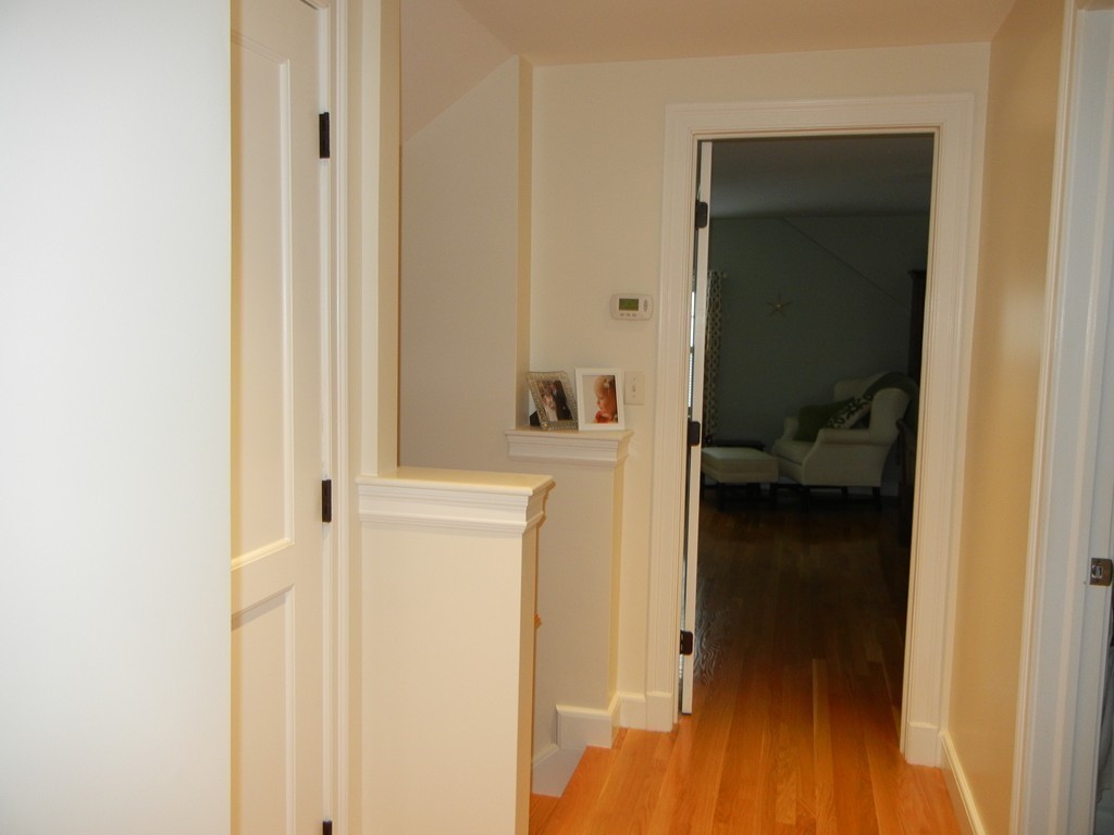 12 Calvert Road Walpole, MA 02032 - Photo 24 of 30 a view of a hallway with bathroom and small space