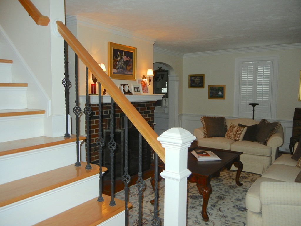 12 Calvert Road Walpole, MA 02032 - Photo 3 of 30 a living room with furniture and a stairs