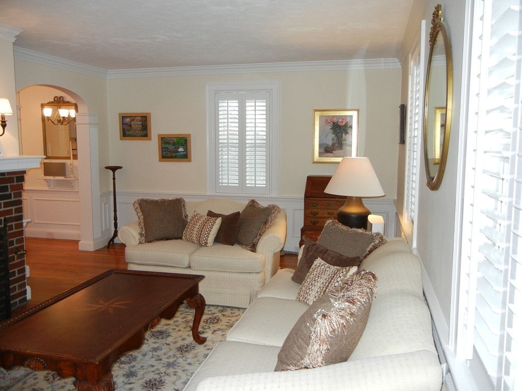 12 Calvert Road Walpole, MA 02032 - Photo 5 of 30 a living room with furniture and wooden floor